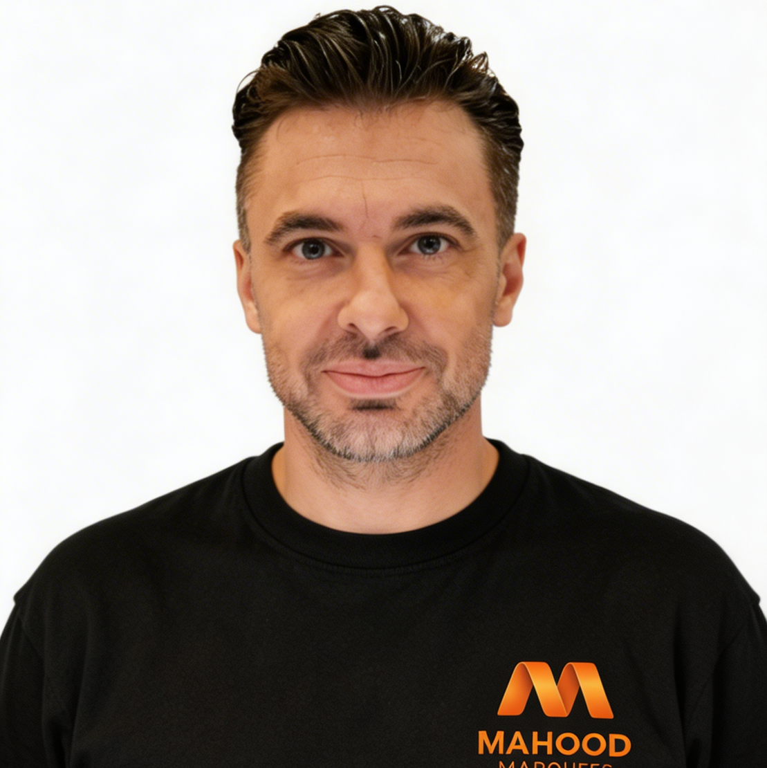 Social media manager for Mahood marquees dressed in black shirt with logo on